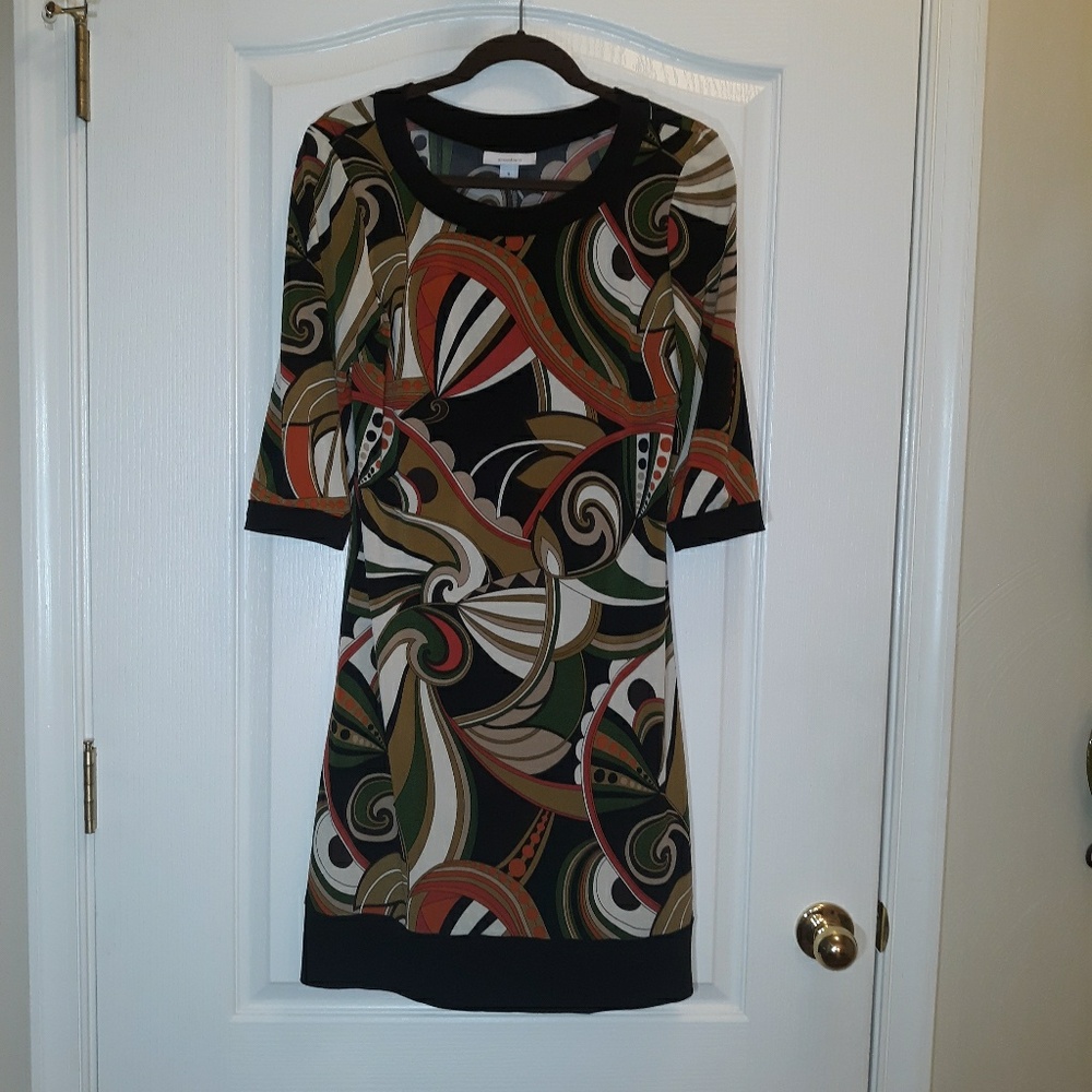 Dressbarn size 8 with 3/4 length sleeve.